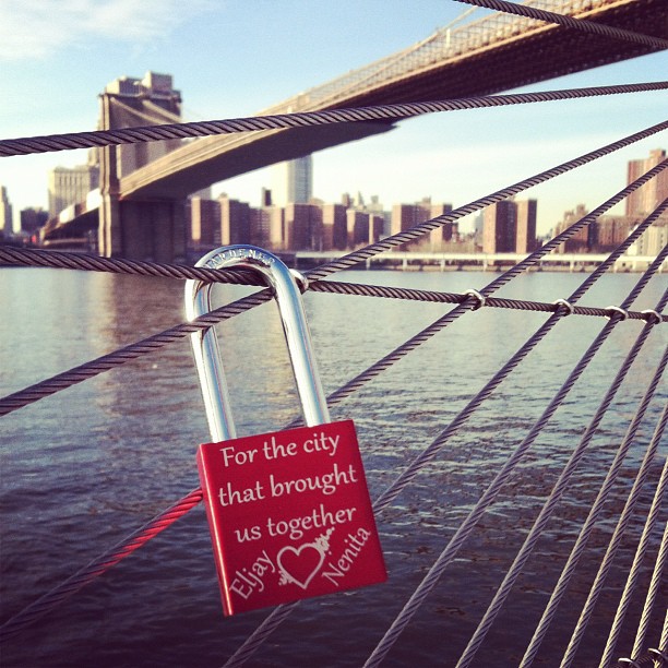 Locked our love today at Brooklyn Bridge Park with my hubby @why_i_love_new_york_city courtesy of @makelovelocks for this beautiful and meaningful lock.  Eljay and I fell in love in NYC and this symbolizes so much!! Stick around since @why_i_love_new_york_city will have a Valentine's giveaway for you all!! Much love ❤❤❤ from my family to yours! #makelovelocks #love #valentines #truelove #love #mybestfriend #bestfriends