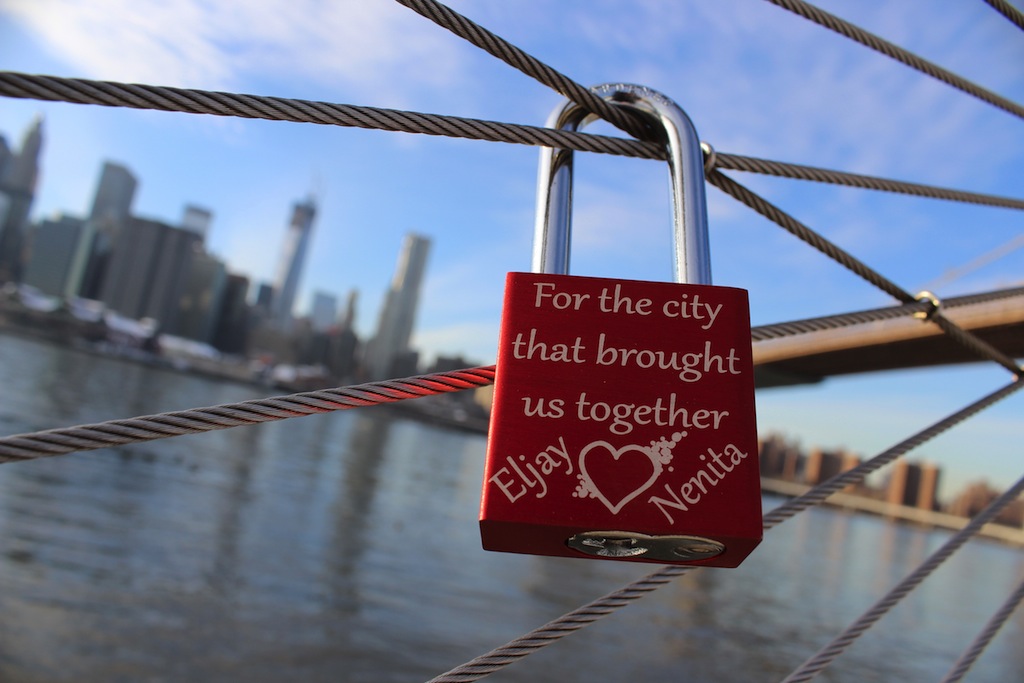 Locks her love at the Brooklyn Bridge Park