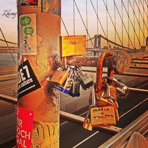 Numerous gym locker-sized locks hang from the railings off the pedestrian path of the Brooklyn Bridge after love-struck tourists put them there following a romantic ritual birthed in Italy.  The symbolic gesture of everlasting infatuation popped up in Rome about 7 years ago as locals started copying the lustful characters in Italian author Federico Moccia’s popular novel “Ho Voglia di Te”, or “I Want You