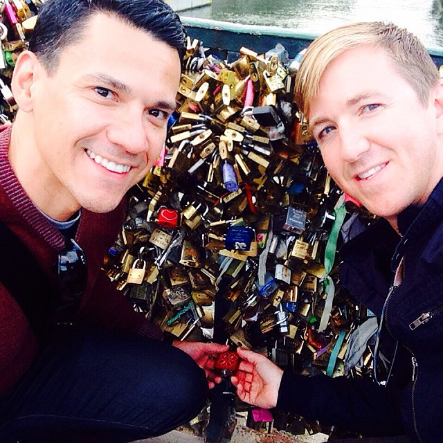 Rick and I locking our lock to one of the love lock bridges in Paris. Beautiful lock inscribed by our friends at #makelovelocks @rrg76 @makelovelocks