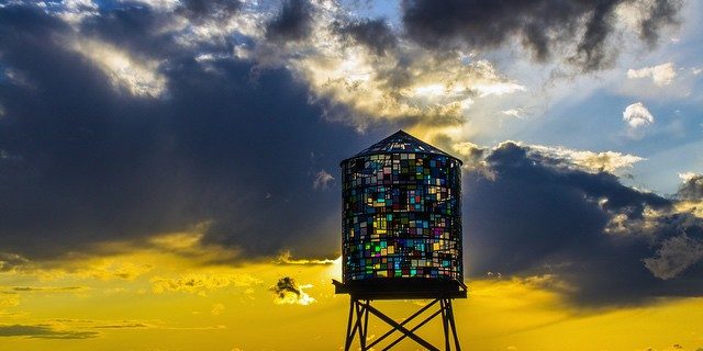 Watertower-Sunstorm.-watertower-sunstorm-Watertower-sculpture-by-@TomFruin.-sunset-sun-storm-splitco